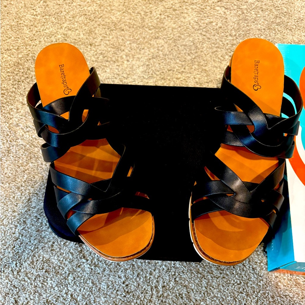 Black strappy sandals.